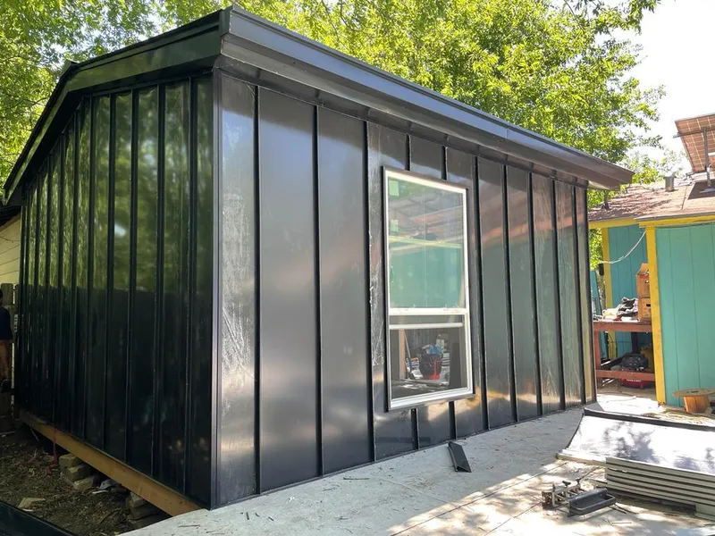 Black standing seam metal wall panels for Metal Roof Installation in Elk Plain