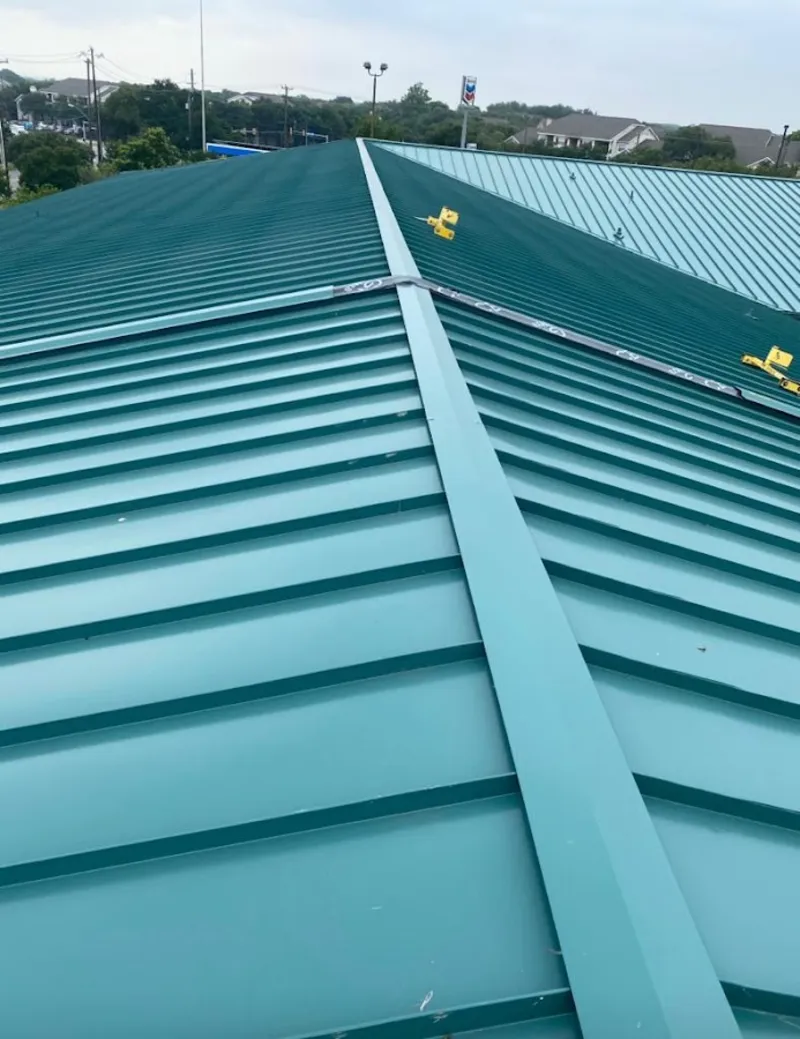 Green commercial metal roof ridge and valley for Metal Roof Repair in Elk Plain
